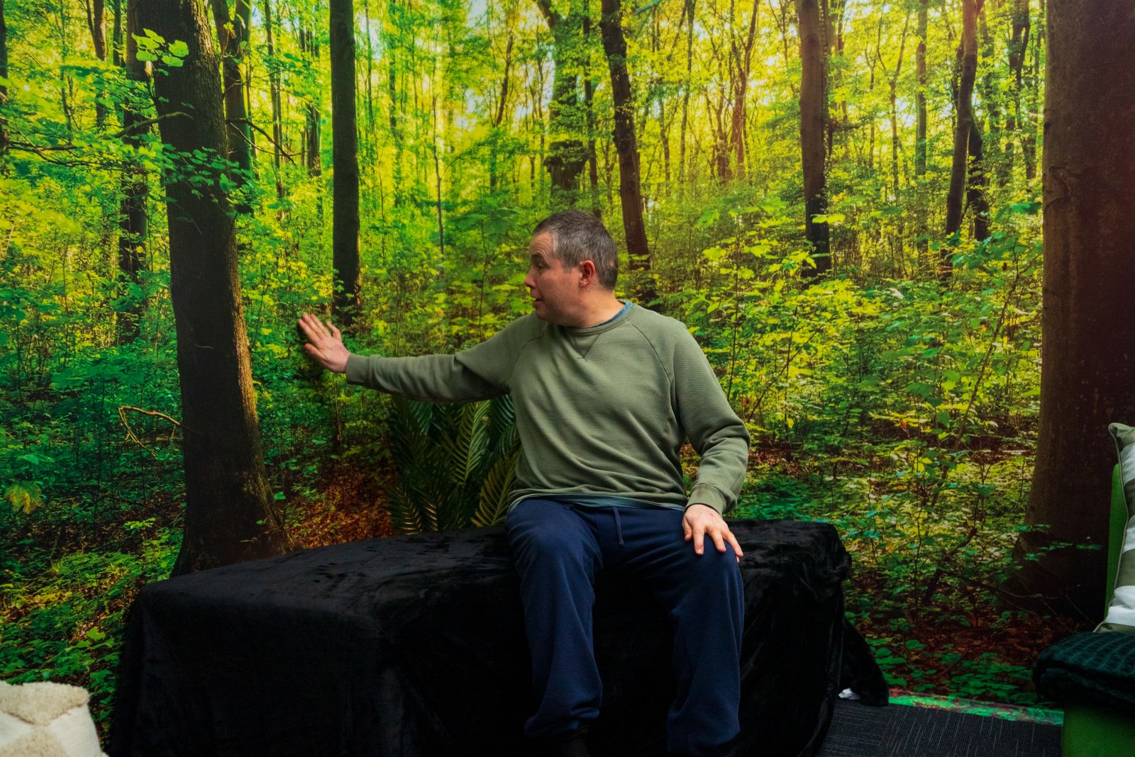 A participant feeling calm in the new rainforest-inspired quiet room