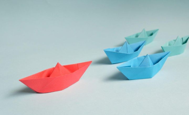 Paper boats on solid surface 194094lg