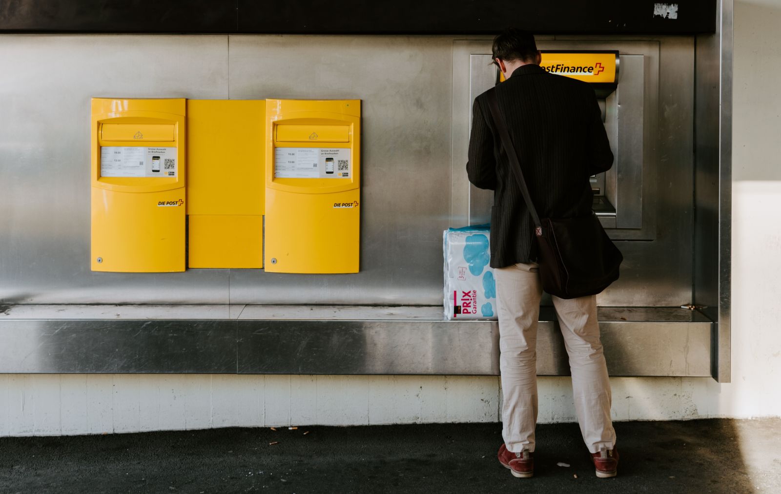 Man using an automatic teller machine